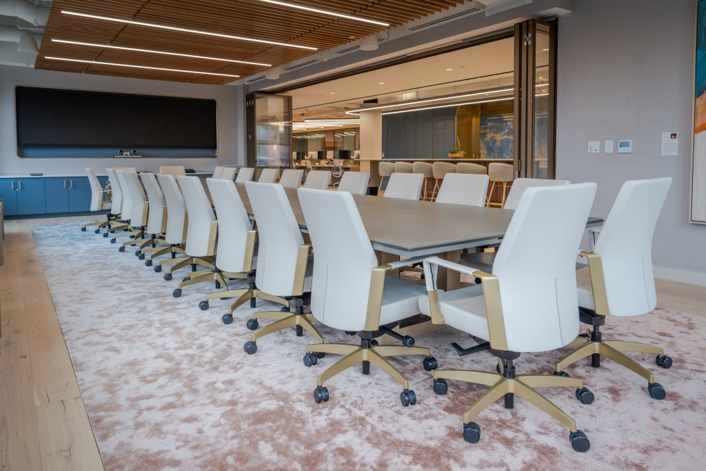 Custom office space with operable glass wall. 