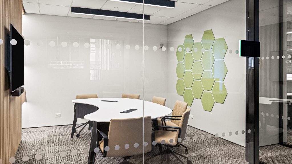 HUSH-at-Financial-Insurance-Firm with green octagonal felt